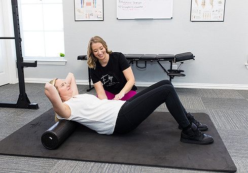 Edge Rehab Chiropractic - Working on lower back pain with hands-on stretching techniques chronic back pain relief core
