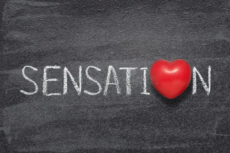 "Sensation expressed creatively with a heart-shaped symbol replacing the letter 'O' on a chalkboard."