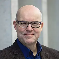 A profile portrait of Stephan Moerker
