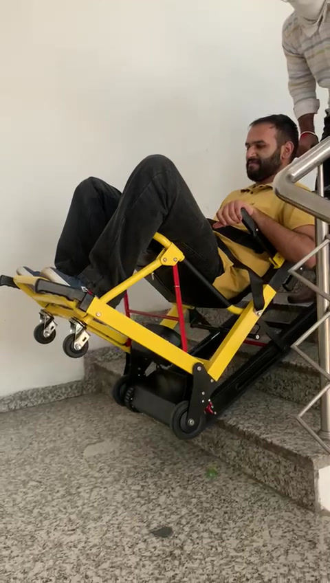 Modern stair climbing wheelchair with electric tracks, demonstrating smooth mobility on stairs for users.