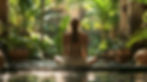 Woman meditating by water in lush, tropical garden. Warm light, green plants, and reflections create a tranquil, serene atmosphere.