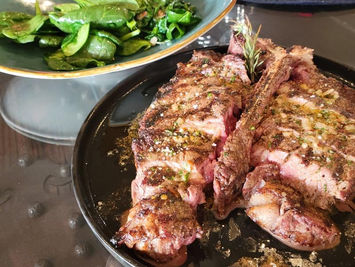 Grilled T-bone steak with spinach