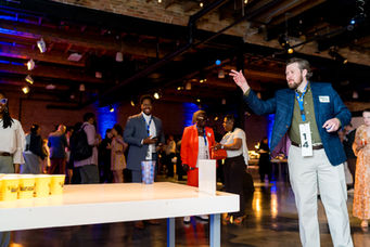 Supporters playing games at an indoor event