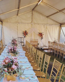 6mx9m event marquee with gold tiffany chairs