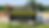 Dollar General construction site with coming soon banner showing 18000 stores and growing