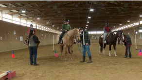 QC students with disabilities learn skills while horseback riding 