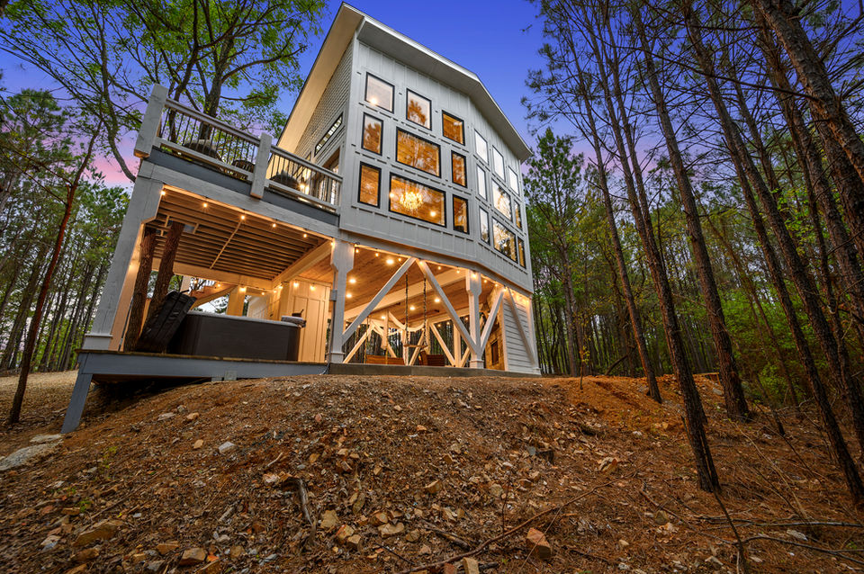 Treehouse at Pine Lake in Broken Bow Cabins Broken Bow Vacay Luxury Broken Bow cabin with a pool 5 Star Amenities in Broken Bow, OK Pine Lake and Hochatown, Oklahoma. Near Beavers Bend State Park, firepit and hot tub. Swinging bed