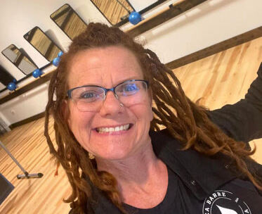 Helen Timmons posing for a selfie during her freetime where she teaches at her local yoga studio. Photo Credit: Grateful Dog Yoga