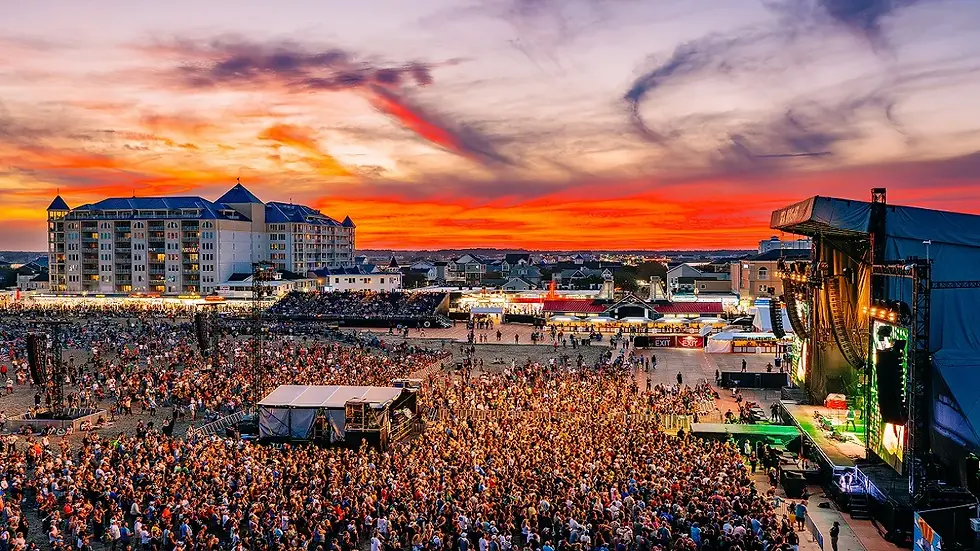 A vibrant crowd gathers at the Oceans Calling concert in Ocean City, Maryland, for the 2025 line-up.