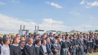 Babheke SPS in the Eastern Cape, South Africa, new Amalooloo toilets with kids singing with gratitude