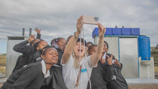 Babheke SPS in the Eastern Cape, South Africa, new Amalooloo toilets with children and SOSNPO CEO, Shelley Humphreys