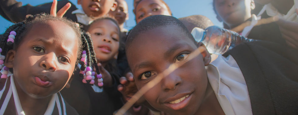 Babheke SPS in the Eastern Cape, South Africa, children looking into camera happy