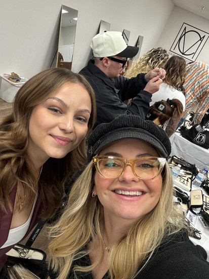 Girls taking hair extension class for Muse Salon