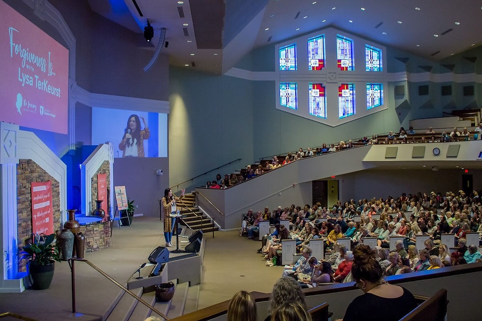 side view of auditorium with speaker on stage