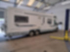 Large campervan in a garage