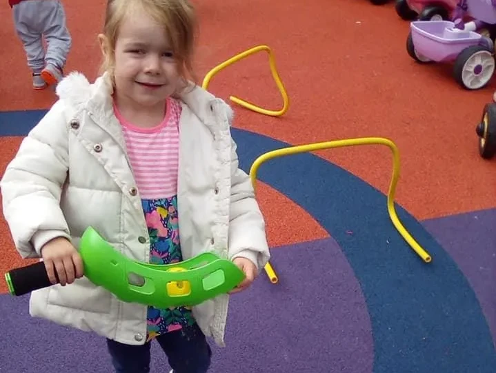 Child playing with toy