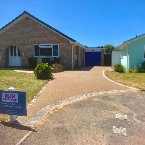 Bungalow with a resin driveway