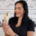 Nina Unrated holding popsicle for mobile content creation