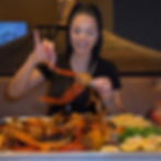 Nina Unrated enjoying a seafood boil for mobile content creation
