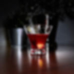 Red cocktail in a glass for mobile content creation