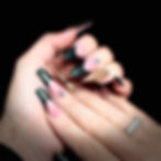 Nina Unrated's Long coffin nails with black tips and gold accents