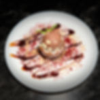 Chocolate dessert on a white plate from a portfolio