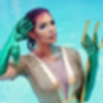Nina Unrated in mermaid aquaman cosplay with trident by a pool