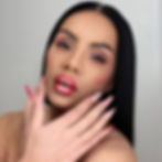 Nina Unrated with heart themed makeup and long decorative nails