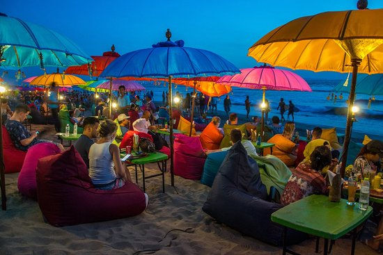 This is La Plancha spreading colourful parasols