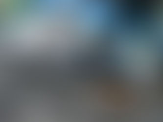 Roofing contractor installing asphalt shingles as part of a roof replacement project in Martha’s Vineyard and Cape Cod