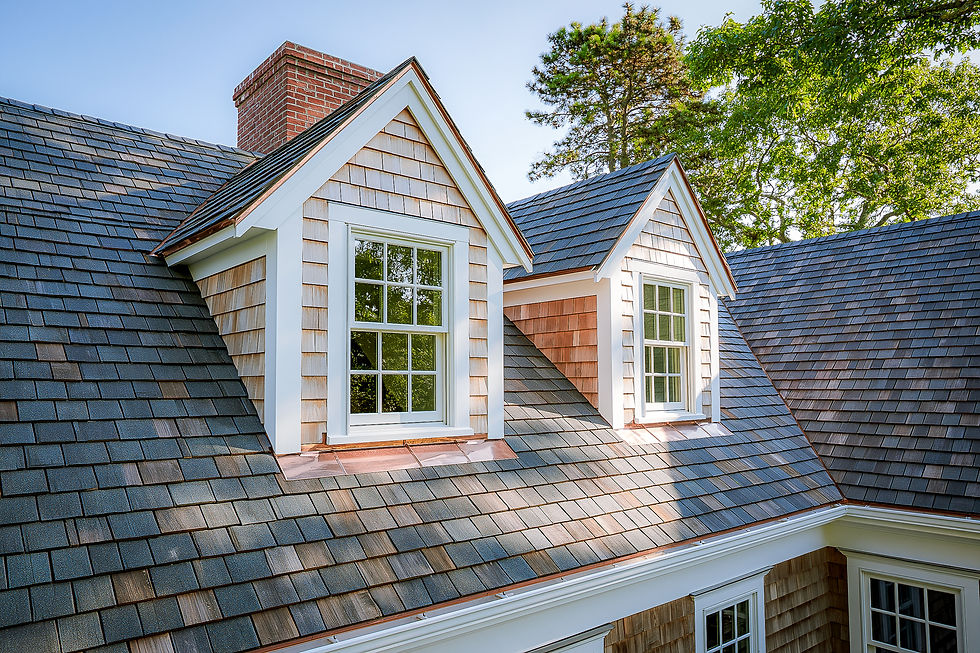 Finished architectural shingle roof with cedar shingle dormers after emergency roof repair on a Martha's Vineyard home