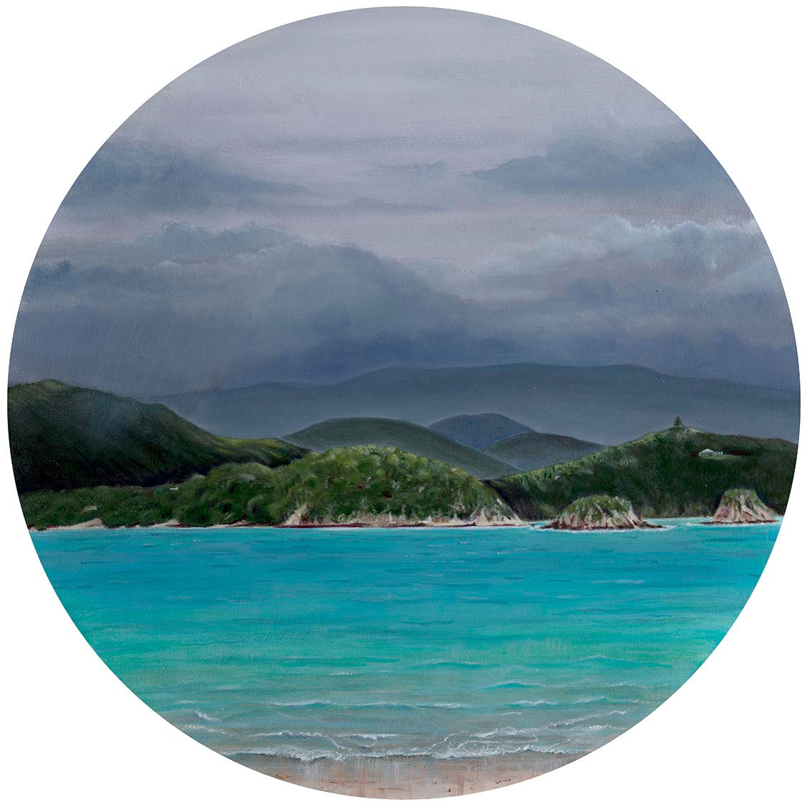 Blue sea and stormy grey sky with land in the background