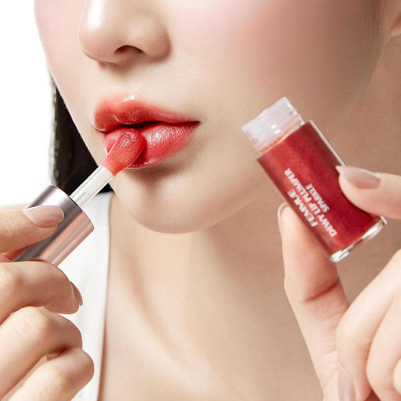 Thumbnail: (代購)日本FEMMUE 細閃保濕豐唇精華 Dewy Lip Plumper Sparkle 4ml (3色可選)