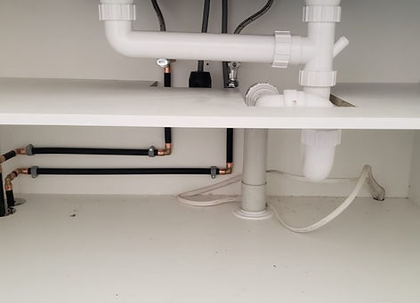 Under sink plumbing