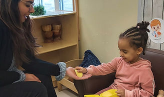a child playing with an adult
