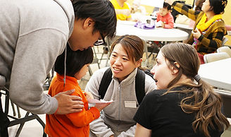 adults talking to child