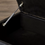Thumbnail: Black Faux Leather Sectional Sofa with Ottoma