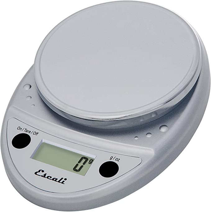 Battery operated kitchen scale is by Escali has a capacity of 11 pounds (5,000 grams) and provides weight readings in 0.05 ounces (1 gram) increments using the following units: oz - ounces, lb:oz (pound to ounces), grams
