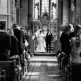 Bride and groom exchanging vows during church wedding ceremony