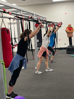 Parkinson's exercise therapy in DFW with TRX straps