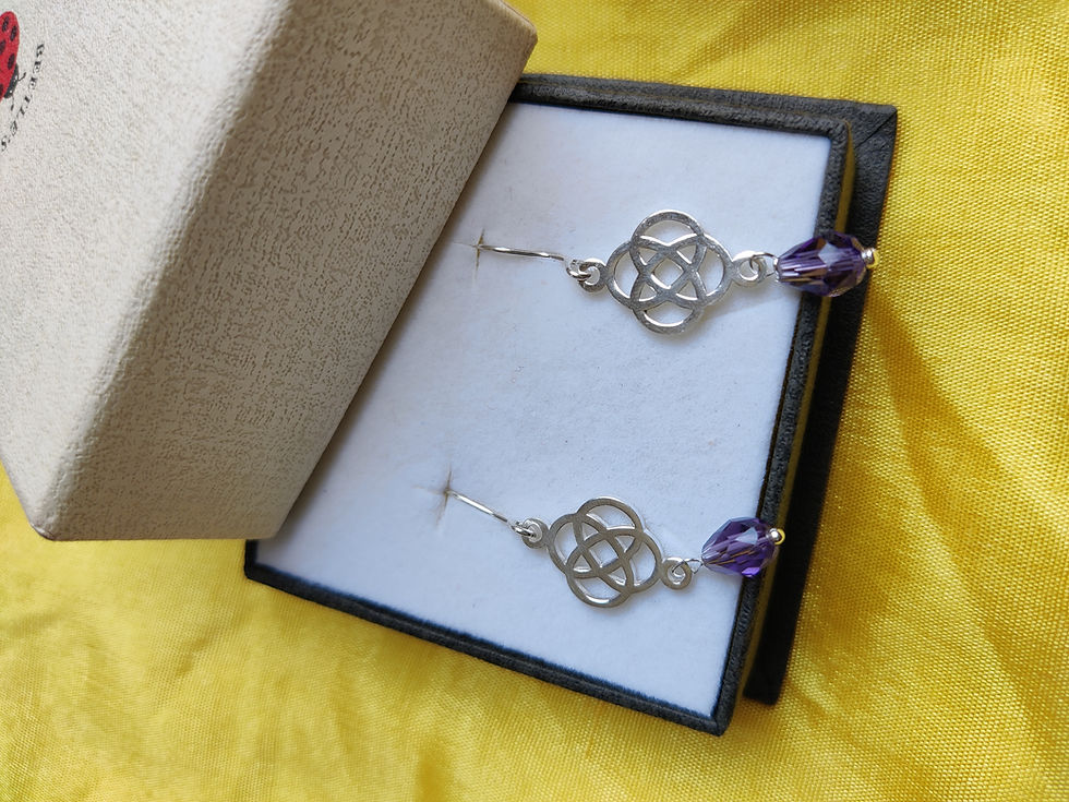 Thumbnail: Celtic knot dangle earrings