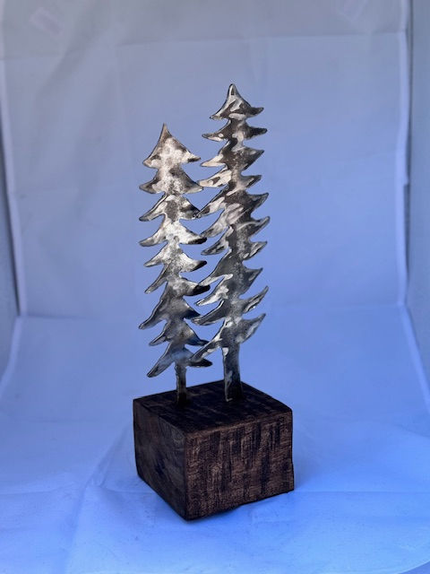 Thumbnail: Steel Cut Trees in Wood Block