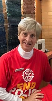 Carol in a red shirt for End Polio Now