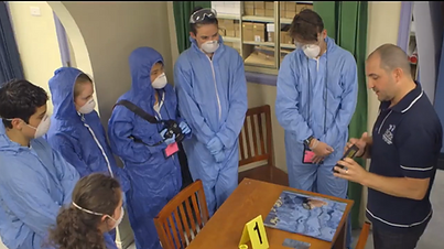 students participating in a forensic testing lesson of a crime scene