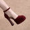 Miniature : Talons hauts élégantes rouge.