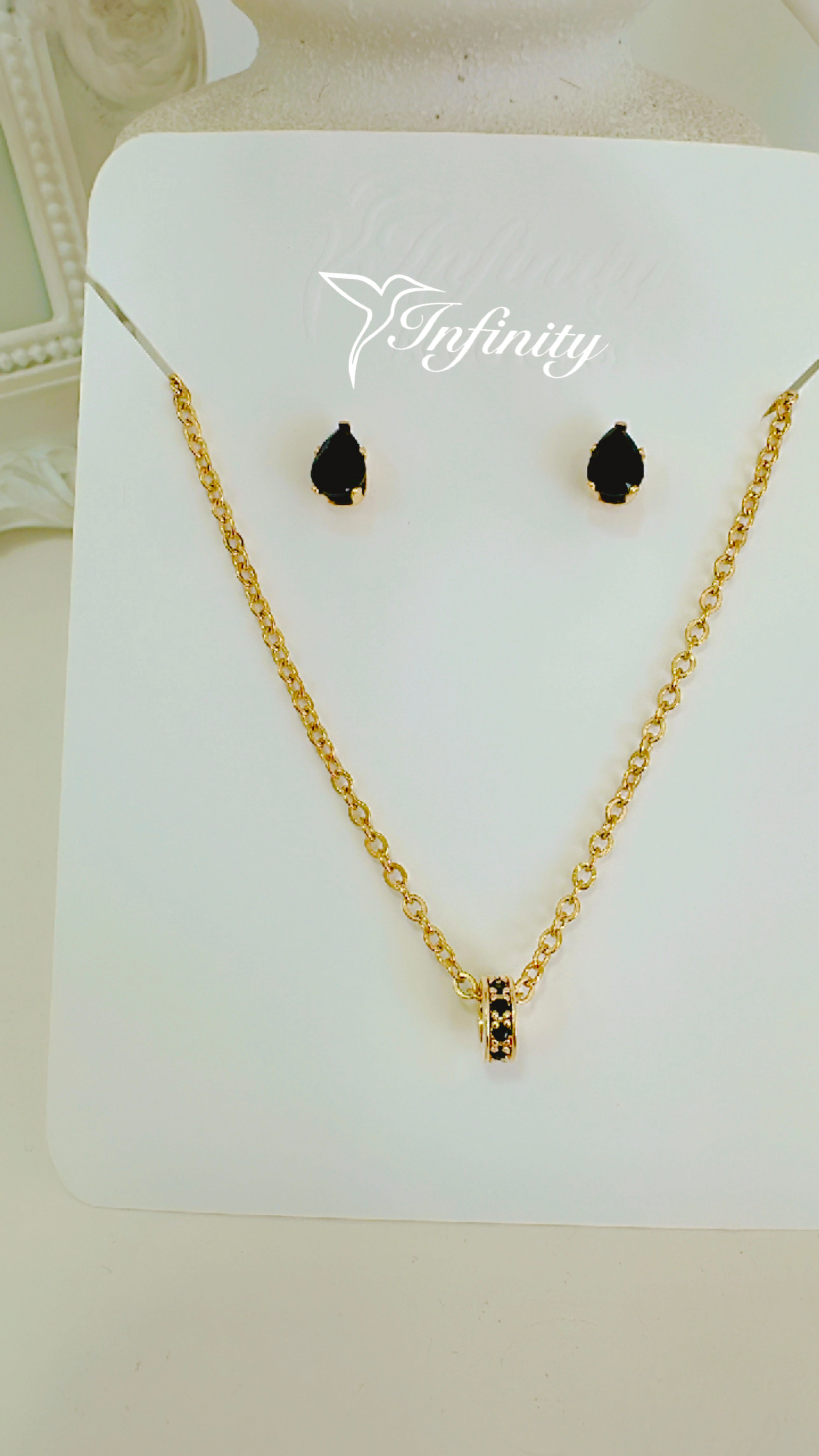 Set de acero  dije de oro laminado