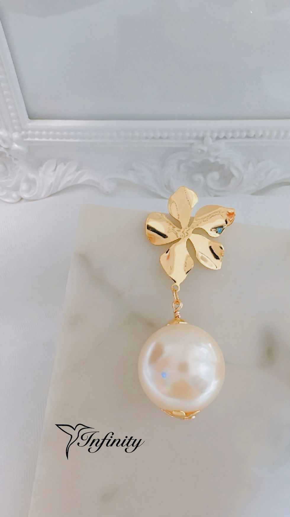 Miniatura: Precio neto aretes de perla de 16 mm con oro laminado