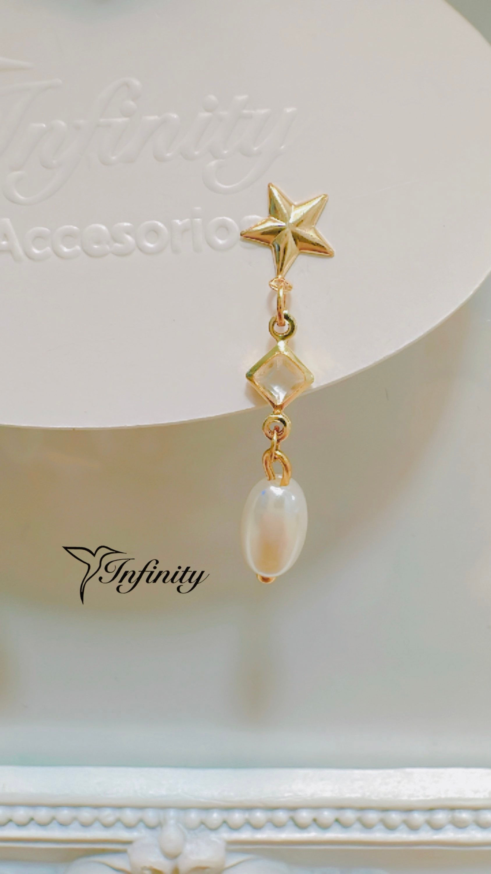 Aretes de oro laminado con perlas
