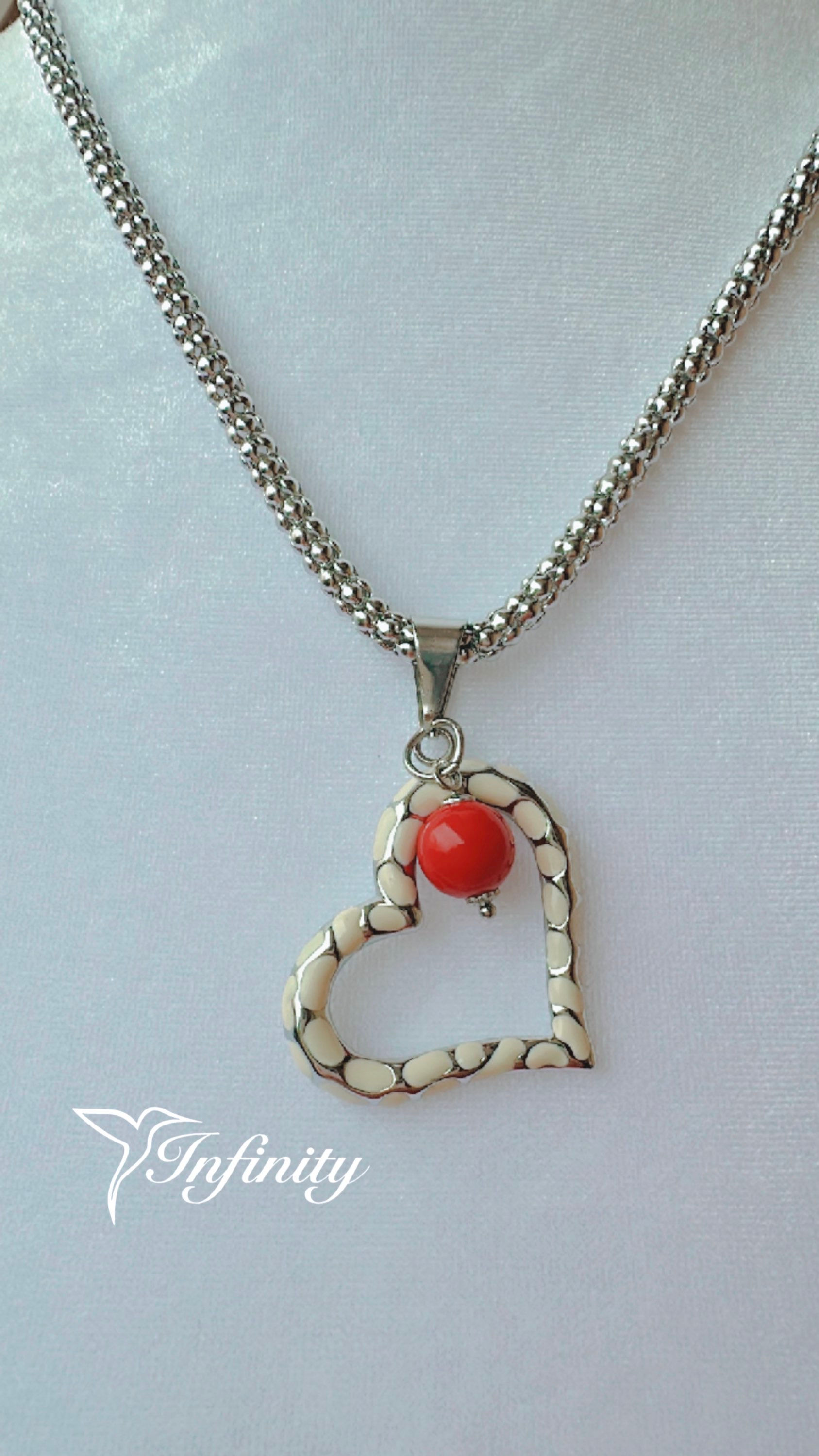 Camisero de acero con dije