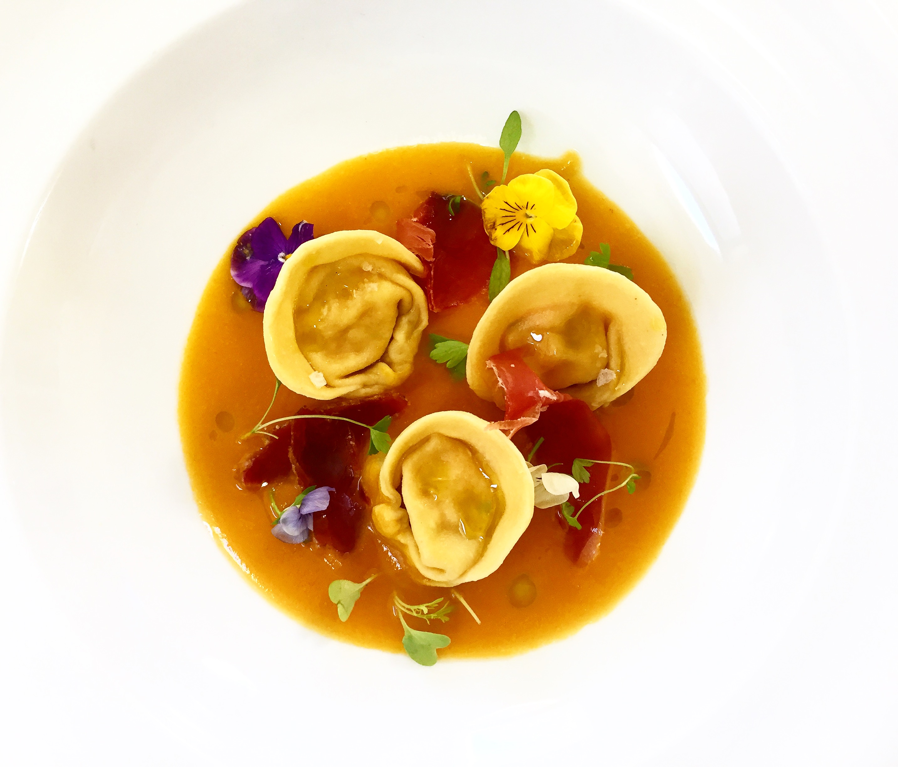 Crab tortellini, carrot & cumin veloute.